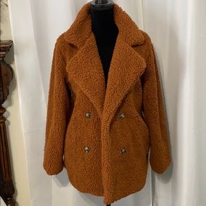 Orangey-rust colored Sherpa coat